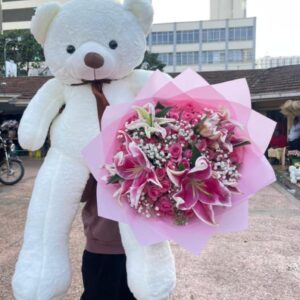 TEDDY BEAR WITH LILLIES